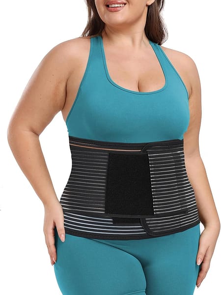 A smiling, attractive plus-size woman modelling a waist trainer.