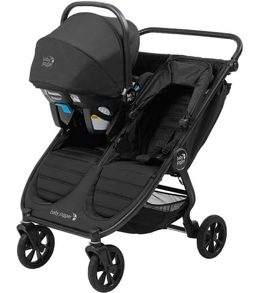 Black and Stylish Baby Jogger City Mini Double Stroller, displaying the bassinet attachment