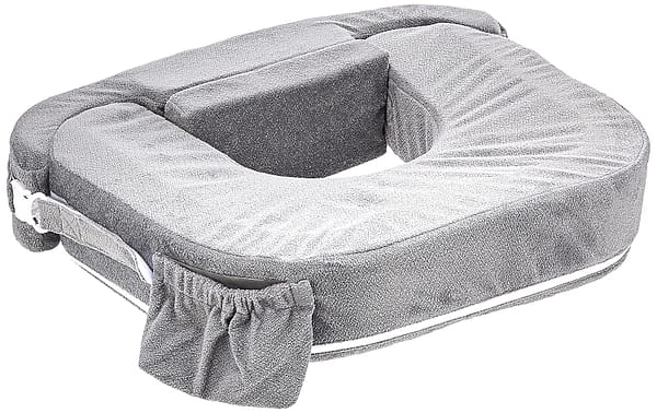 A soft grey Twin Nursing Pillow, used for breastfeeding or bottle feeding twins