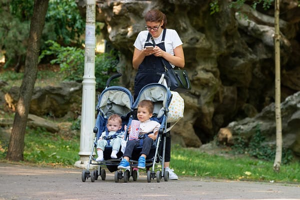 mother, twins, out for a walk, double stroller