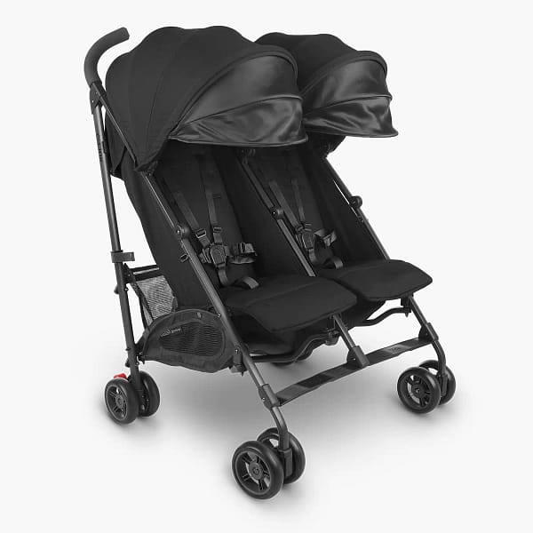An attractive black double stroller for twins