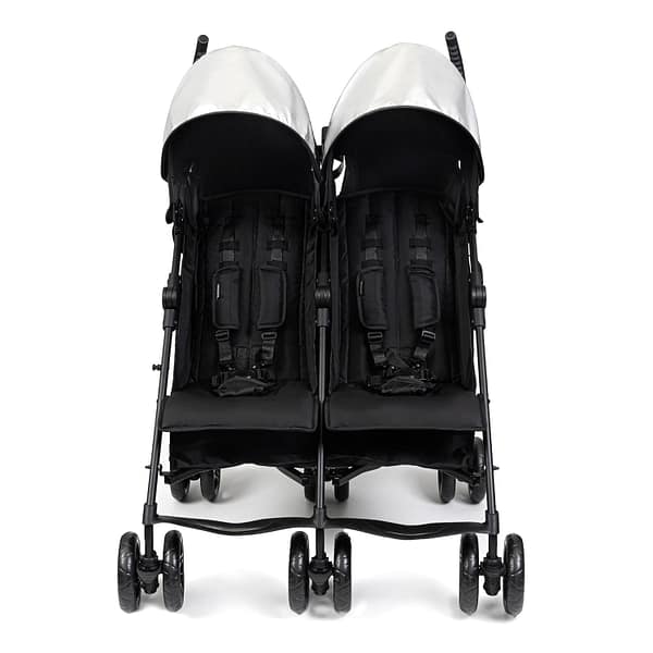 A sleek black travel stroller double with a silver hood.